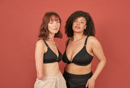 what is an adaptive bra? two beautiful young women staring intently into the camera while wearing Springrose adaptive bras