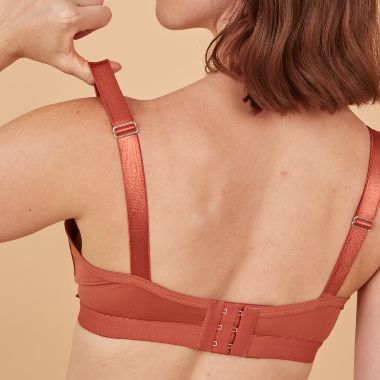 The adaptive bra's hook and eye closure and wide shoulder straps