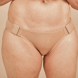 Close up of the Springrose magnetic adaptive underwear on a model.