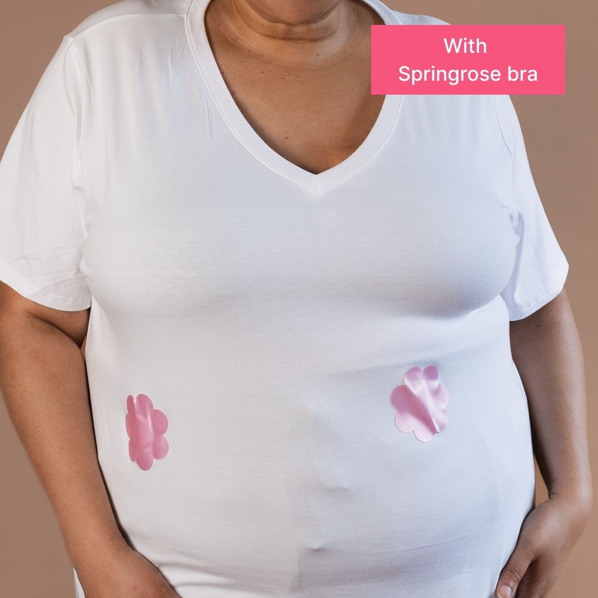 Showing the supportive nature of the Springrose Goddess Lift Mobility Bra, an adaptive bra for larger busts