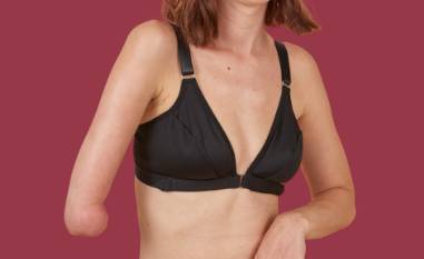 One arm bra / one handed bra in black on a woman with a limb difference on her right side