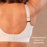 Beautiful mature model showing the supportive back of the adaptive bra in almond