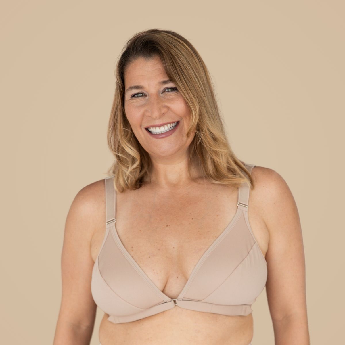 The original version of the Springrose Easy-On Mobility Bra with its velcro front closure, which includes a seam across the cup.