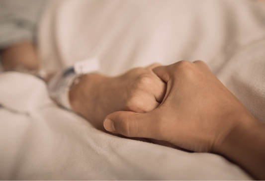 Unsupportive husband after surgery: holding hands while one person is in the hospital