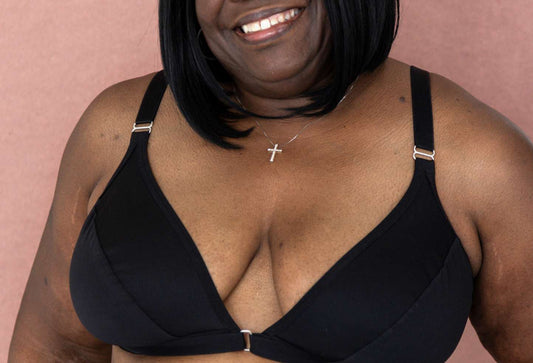 Are bra sizes universal: close up of a mature full bust woman wearing the Springrose adaptive bra