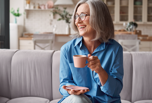 best bras for limited mobility - a woman comfortably enjoying a coffee at home