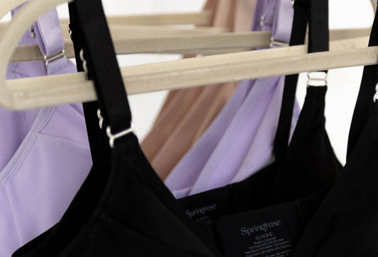 How many bras should a woman own: a close up of a rack of adaptive bras