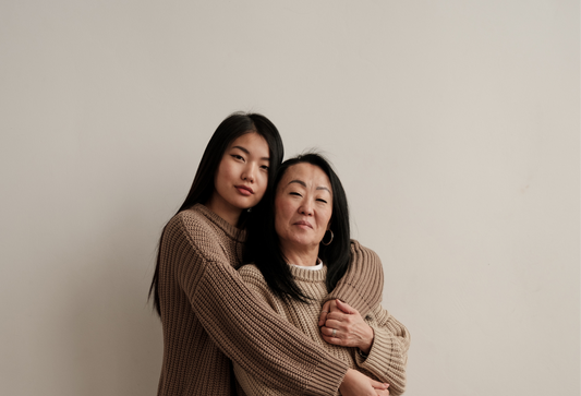 Useful Things for Stroke Survivors: a young asian woman is hugging her mother, an older asian woman