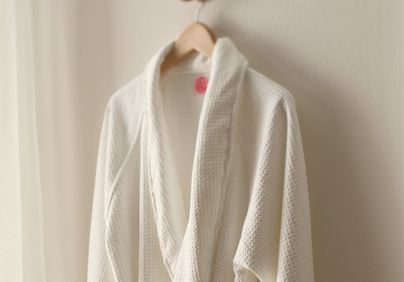 What Should Women Wear After Surgery: a white robe hanging