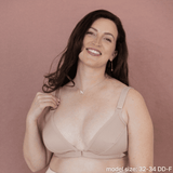 Model is wearing the best front closing bra for seniors in beige - an adaptive bra with a velcro front closure