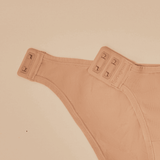Flatlay of the Springrose adaptive underwear's magnet side closure. The magnet is open. 
