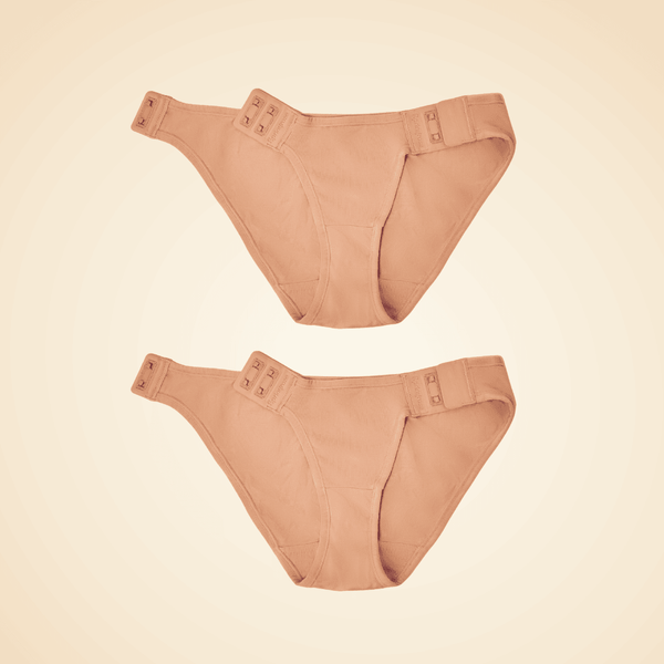 Two adaptive panties showing the magnet side closures in an open position.