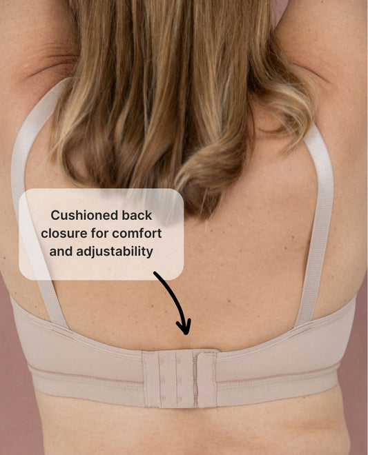 An image of the easy-on bra's back closure with the text: cushioned back closure for comfort and adjustability.