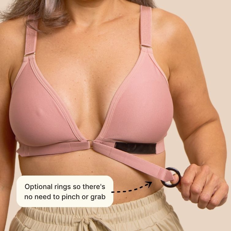 Close up of the Velcro bra in pink, showcasing the Velcro front closure and optional gripping ring