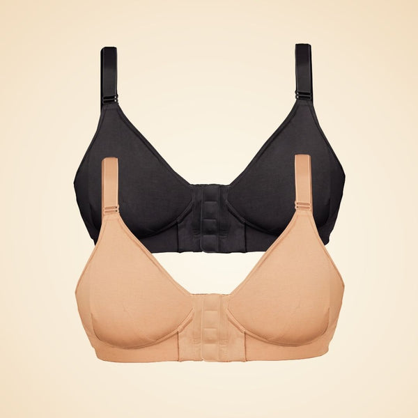 Two adaptive magnet bras, one in beige and one in black, overlaid over each other