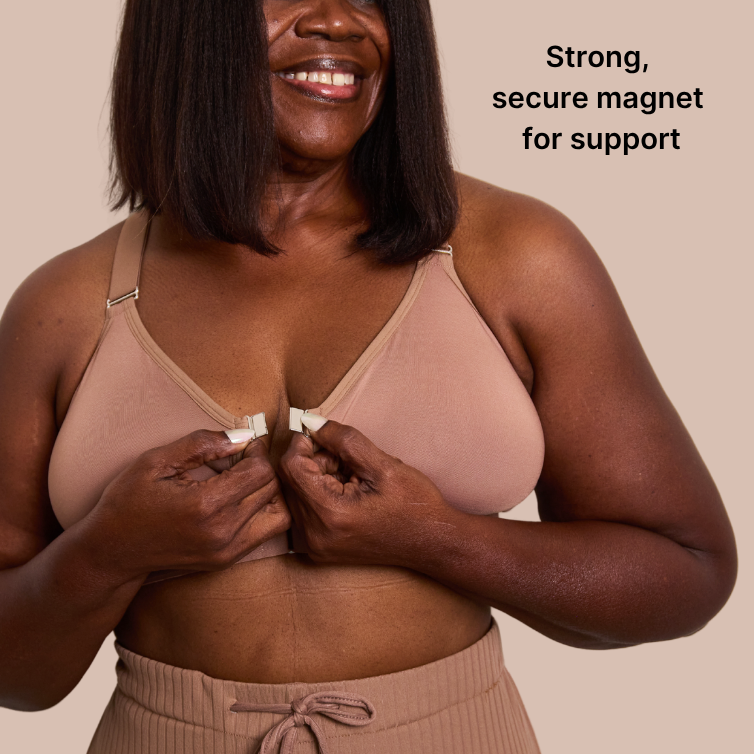 Close up of the magnetic closure on the Springrose adaptive bra in mocha. Text reads: strong, secure magnet for support