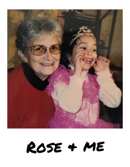 Polaroid looking picture of Nicole and grandmother Rose. Grandmother Rose is staring straight at camera with a big smile, while Nicole (6 years old and in a pink princess dress) is gesturing with her hands and smiling wide
