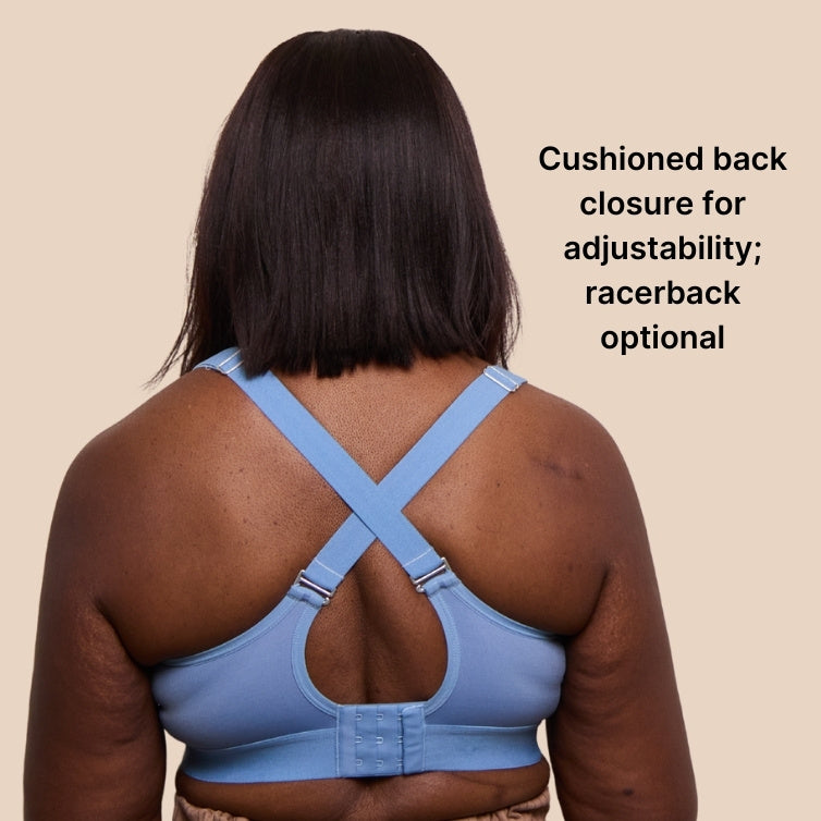 The back of the velcro bra in Neptune Blue in a racerback configuration. Text reads: cushioned back closure for adjustability, racerback optional