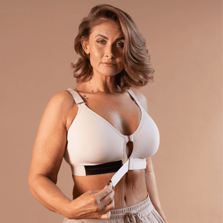 A model in the Springrose arthritis bra for bigger busts showing the arthritis bra's velcro front closure and gripping ring