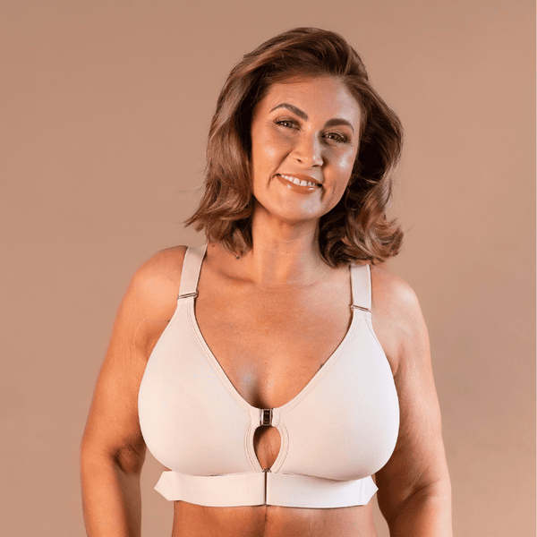 Beautiful mature model showing the supportive adaptive velcro bra in almond
