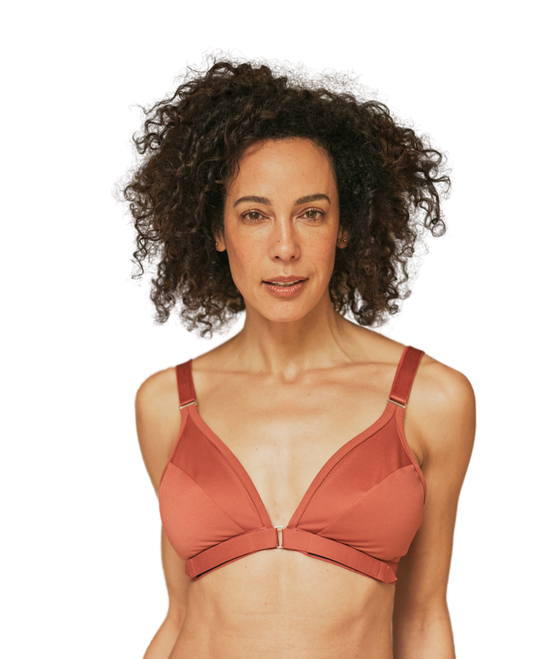 Beautiful woman with curly hair wearing a front opening wireless bra